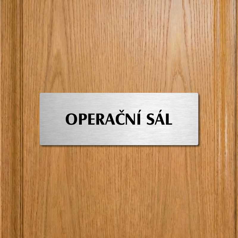 Operační sál, 240x79mm, zlatá popiska s okrasným rámečkem  